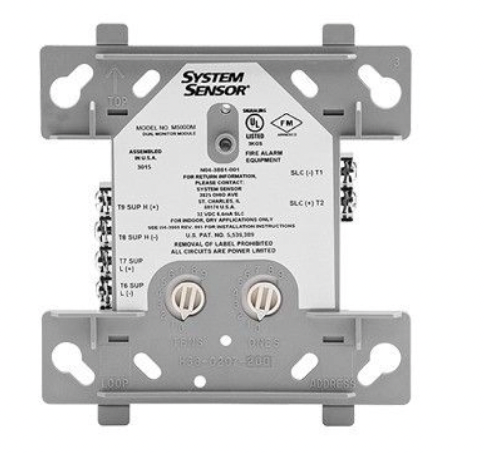 Close-up of SK-MONITOR-2 rotary address switches and wiring terminals at island electrical supply