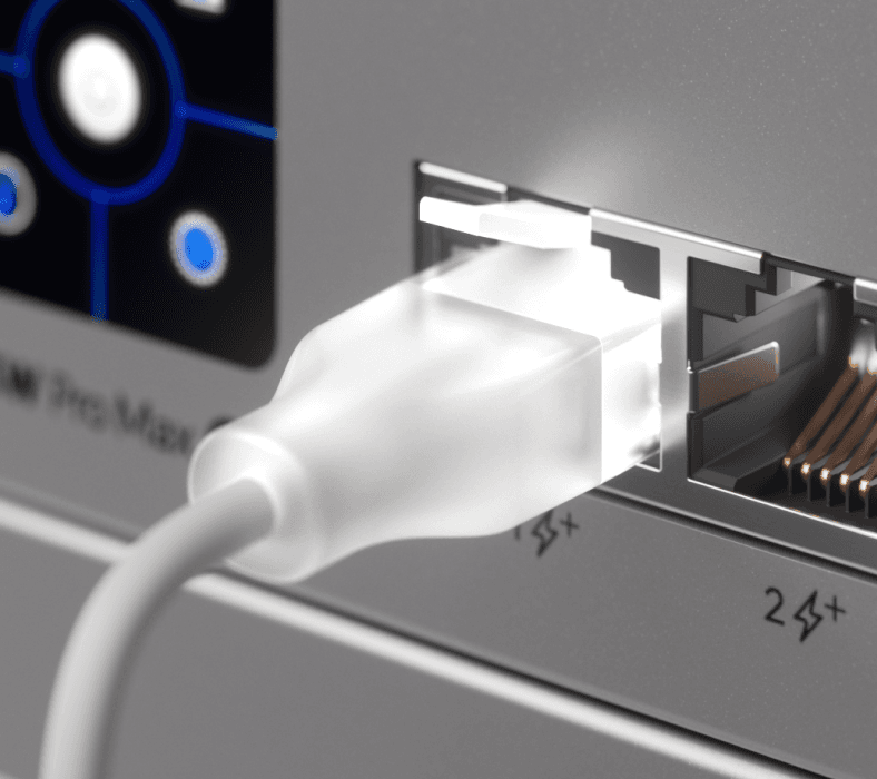 Close-up of booted RJ45 connector showcasing Etherlighting effects