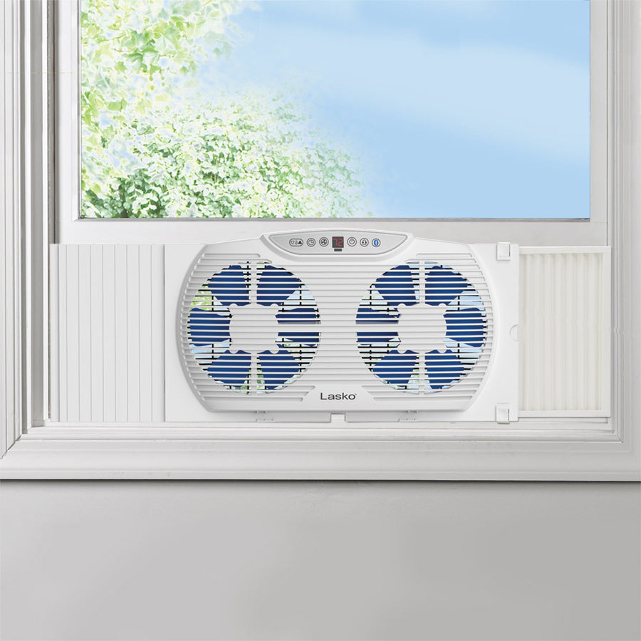 Life-Style Image for Lasko Electrically Reversible Twin Window Fan with Bluetooth