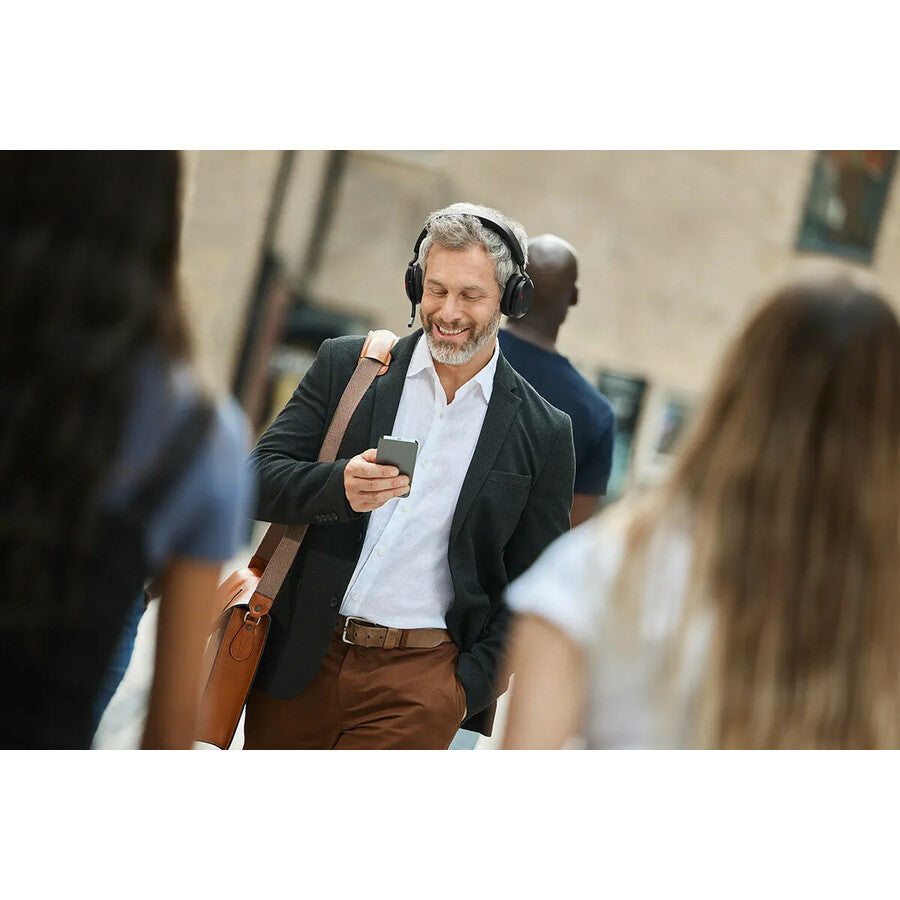 Life-Style Image for Jabra Evolve2 75 Wireless On-ear Stereo Headset - USB-C - For MS Teams - With Charging Stand - Black - Binaural - Ear-cup - 3000 cm - Bluetooth - 20 Hz to 20 kHz - MEMS Technology Microphone - Noise Cancelling
