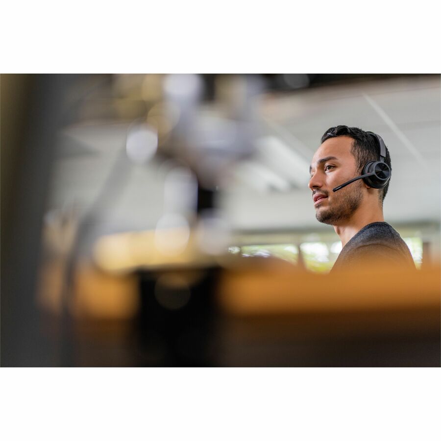 Life-Style Image for Poly Voyager 4310 UC Monaural Headset + BT700 USB-A Adapter + Charging Stand