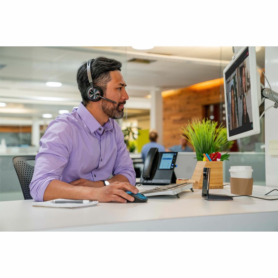 Life-Style Image for Poly Voyager Focus 2 USB-C-C Headset +USB-C/A Adapter + Charging Stand