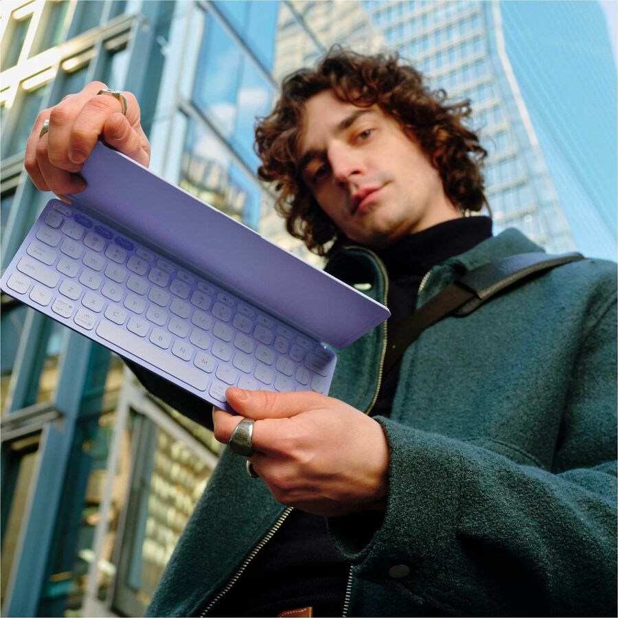 Life-Style Image for Logitech Keys-To-Go 2 Portable Bluetooth Keyboard for Tablet With Built-in Cover, Slim and Compact Wireless Keyboard for Windows, Android, Linux, iPad, iPhone, Mac, Apple TV (Lilac)