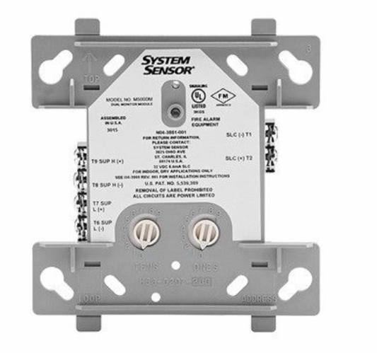 Close-up of SK-MONITOR-2 rotary address switches and wiring terminals at island electrical supply