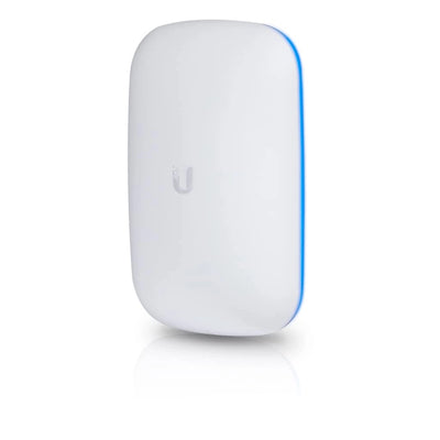 Ubiquiti UniFi BeaconHD plugged into wall outlet with sleek white design
